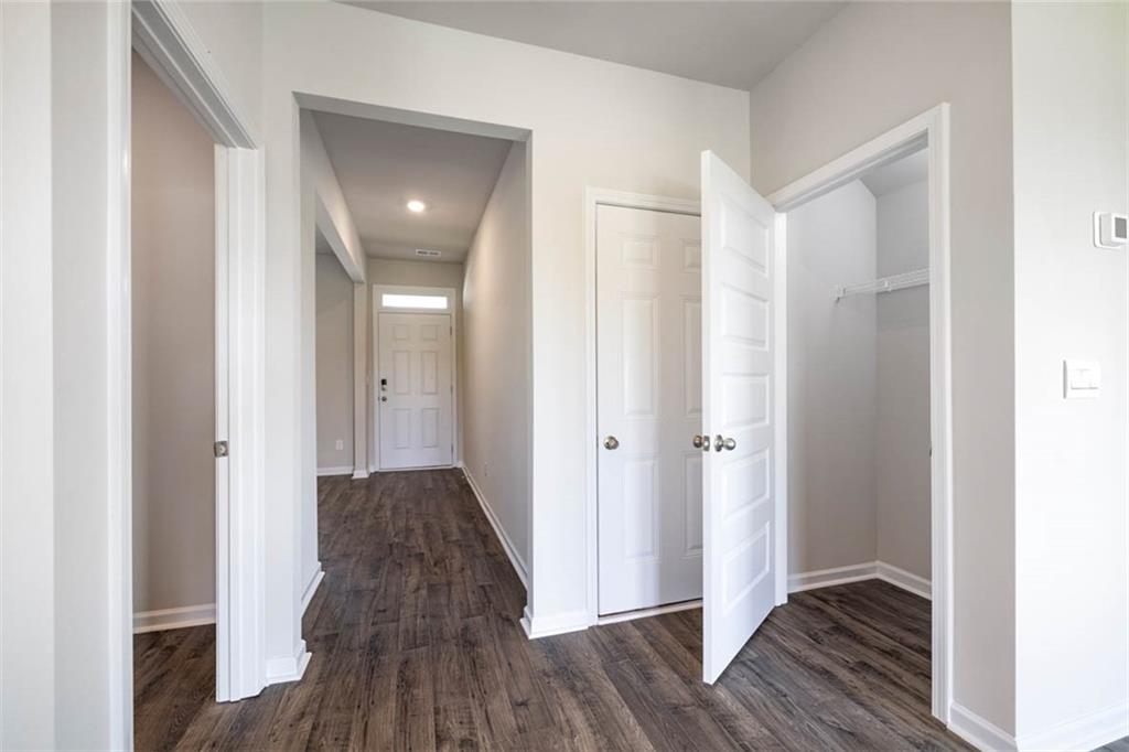 652 Whitman Lane Stockbridge, GA 30281 - Photo 28 of 36 a view of hallway with wooden floor