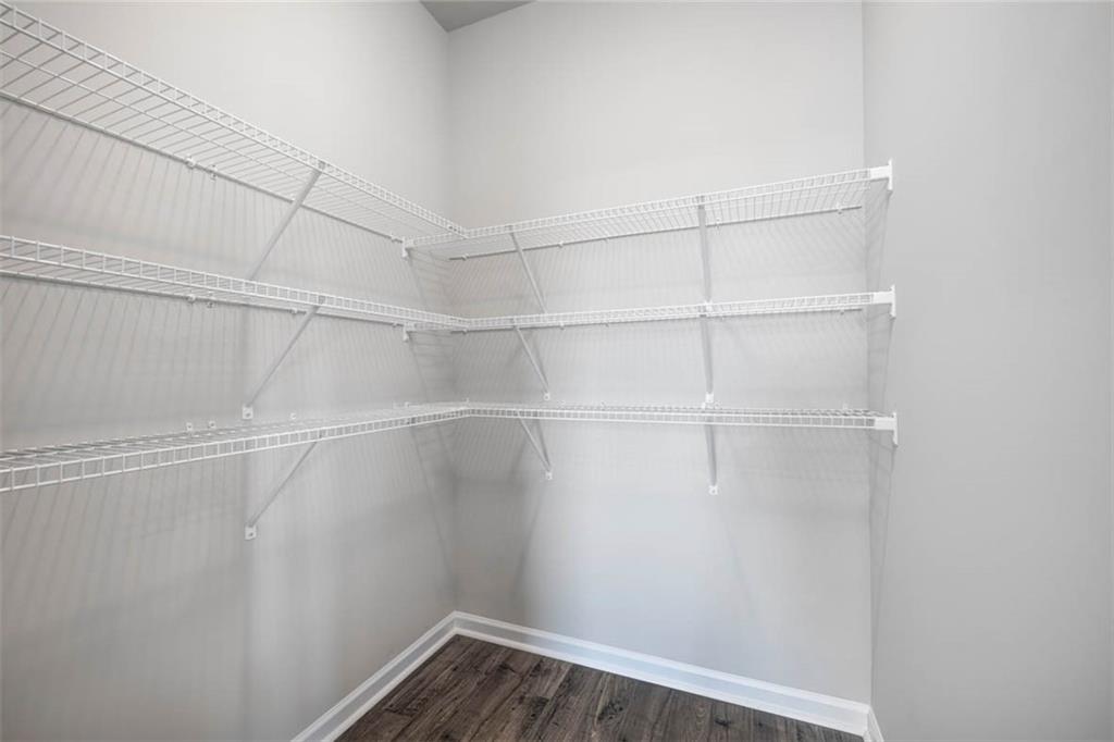 652 Whitman Lane Stockbridge, GA 30281 - Photo 31 of 36 a view of a room with racks on the wall