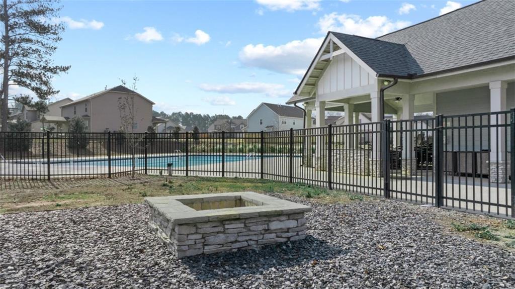 652 Whitman Lane Stockbridge, GA 30281 - Photo 6 of 36 a view of house with a yard and sitting area