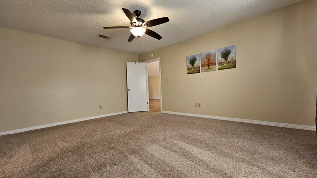 a view of a livingroom with wooden floor