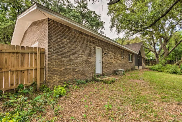 a backyard of a house with lots of green space