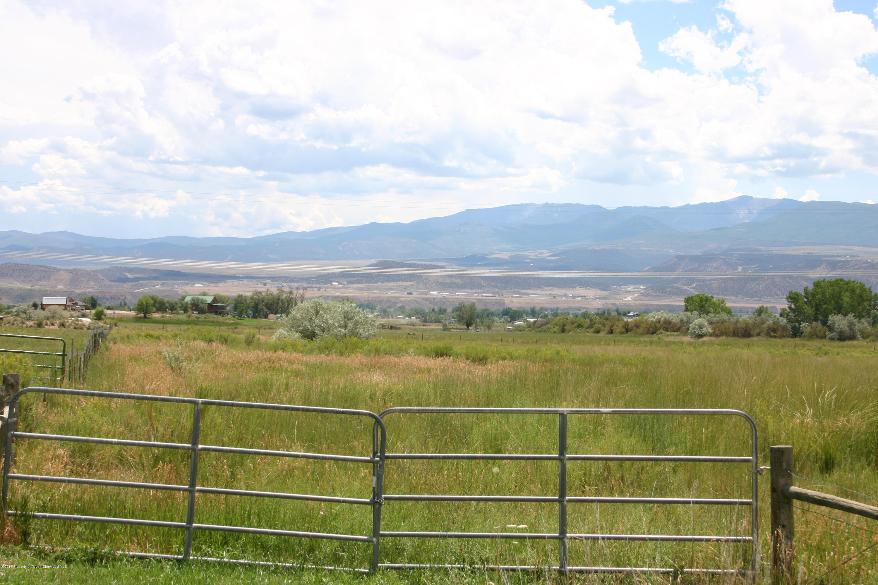 27 County Road 259 Rifle, CO 81650 - Photo 1 of 7 a view of a lake with a mountain