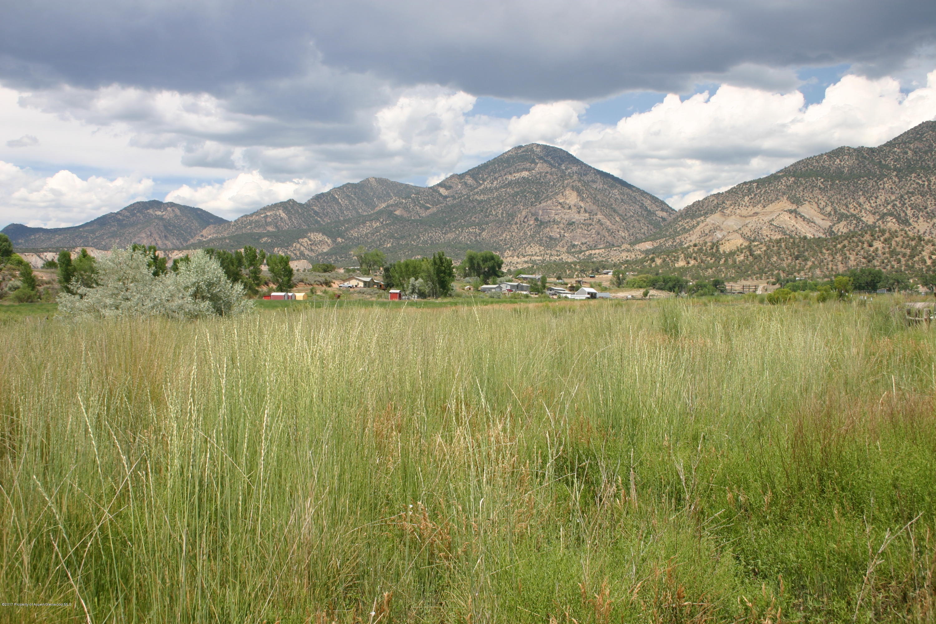 27 County Road 259 Rifle, CO 81650 - Photo 2 of 7 a view of a lake with a mountain in the background