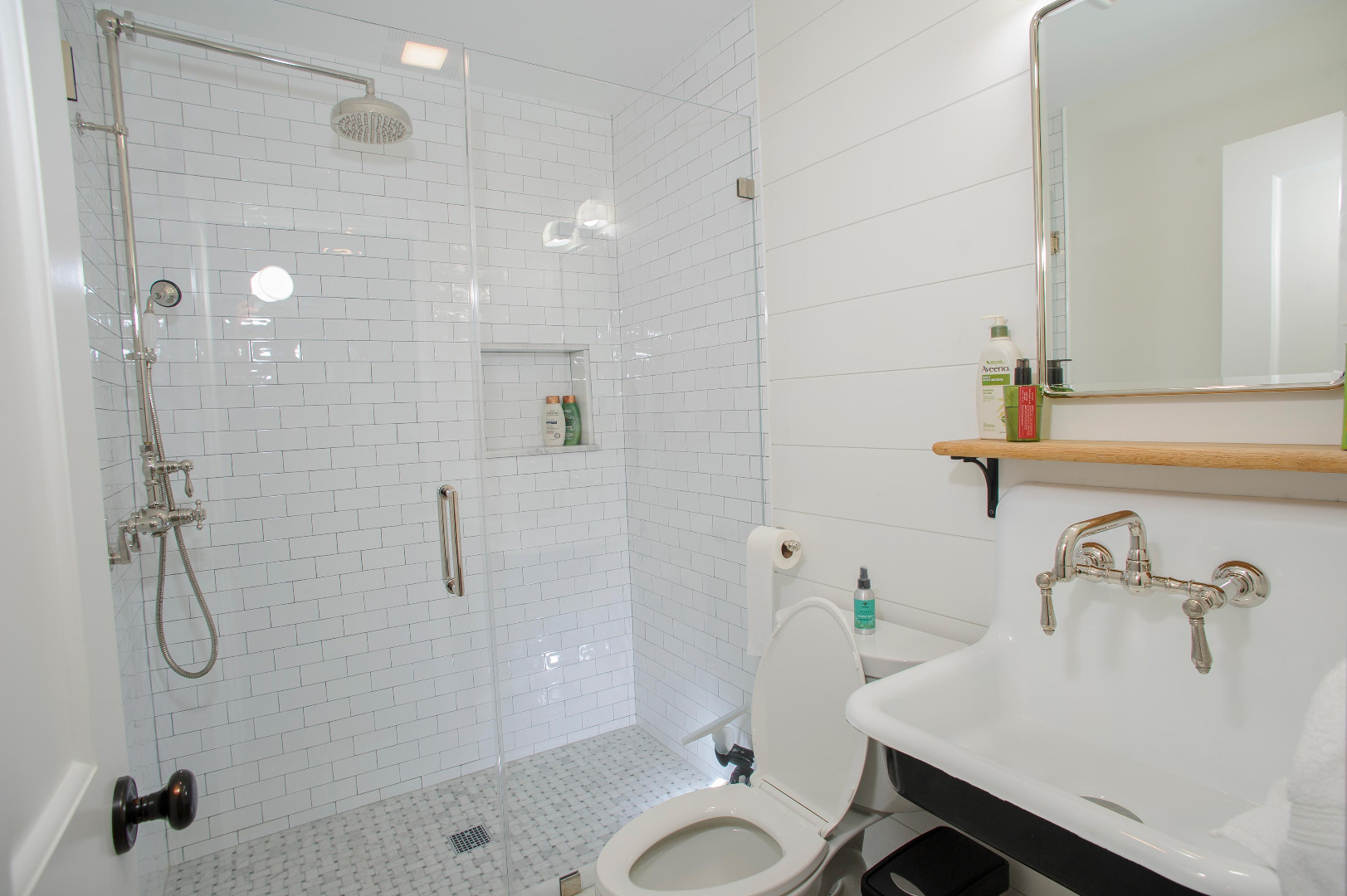 31 North Street Edgartown, MA 02539 - Photo 30 of 49 a bathroom with a sink a toilet and shower