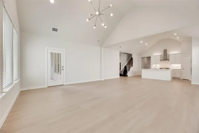 a view of a livingroom with furniture and a window