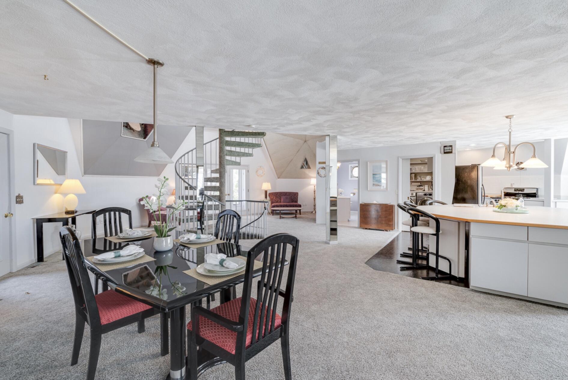 37 Amy Brown Road Mashpee, MA 02649 - Photo 21 of 59 a view of a dining room with furniture and wooden floor