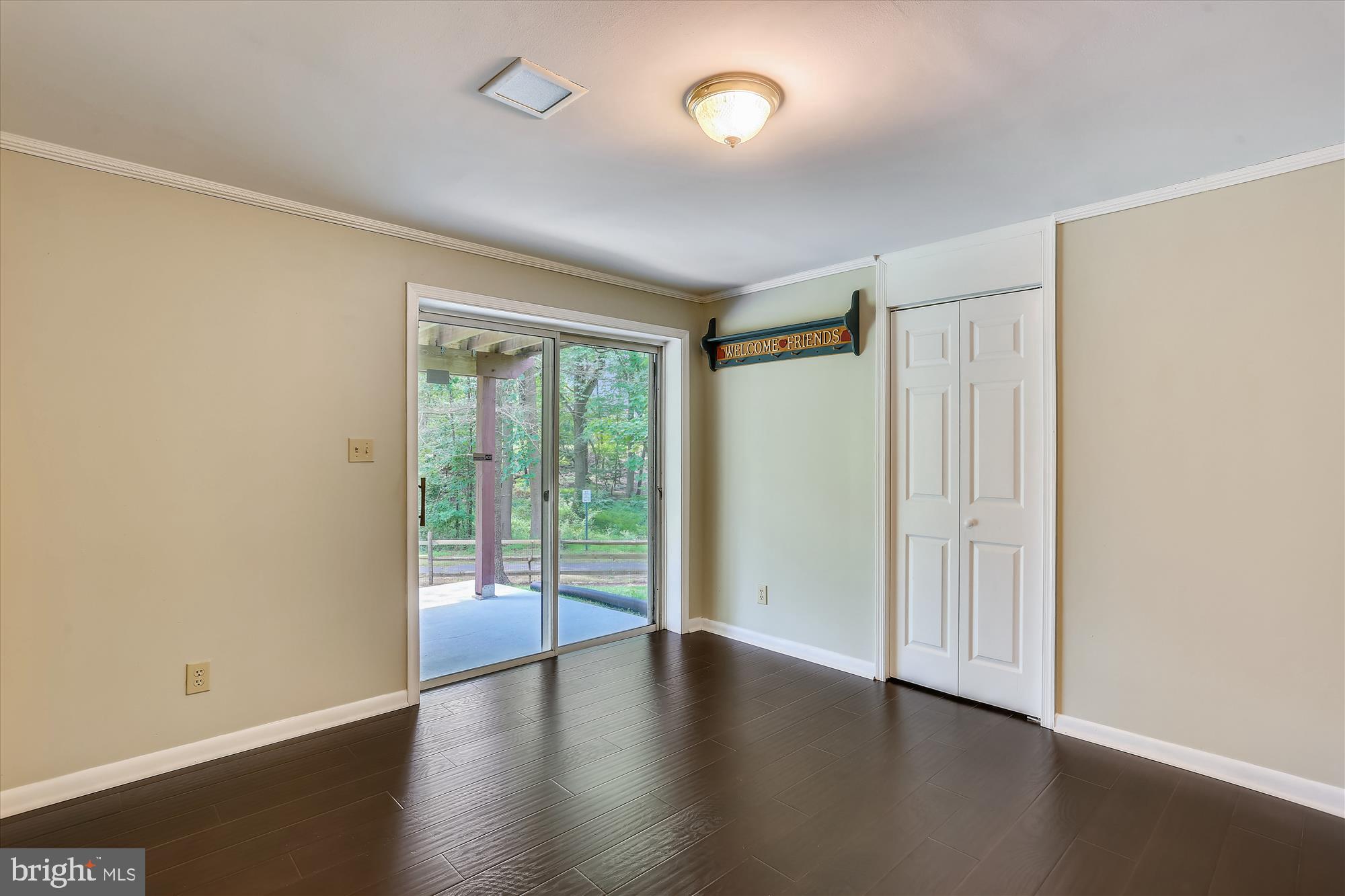 8908 Spring Berry Court Gaithersburg, MD 20886 - Photo 38 of 59 Bedroom 5 with sliding glass doors to patio