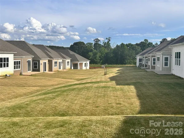 a view of a house with a ocean view
