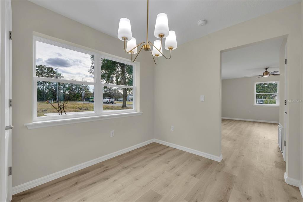 31201 Merry Road Tavares, FL 32778 - Photo 20 of 40 a view of a livingroom with a large window
