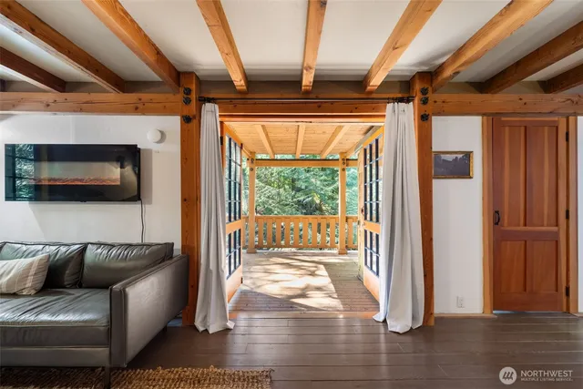 a bedroom with a bed and a table