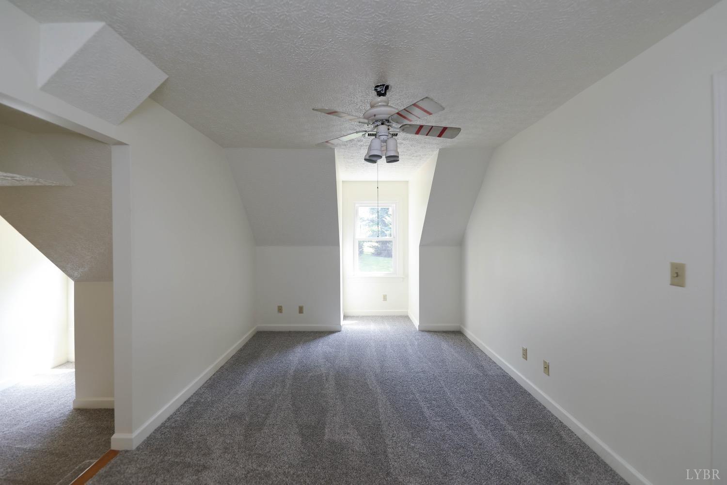 1878 Cifax Road Forest, VA 24551 - Photo 45 of 88 an empty room with wooden floor and windows