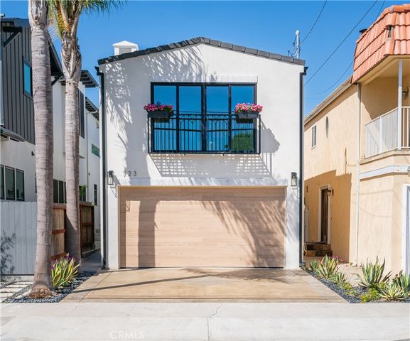 a view of a house with a small garden