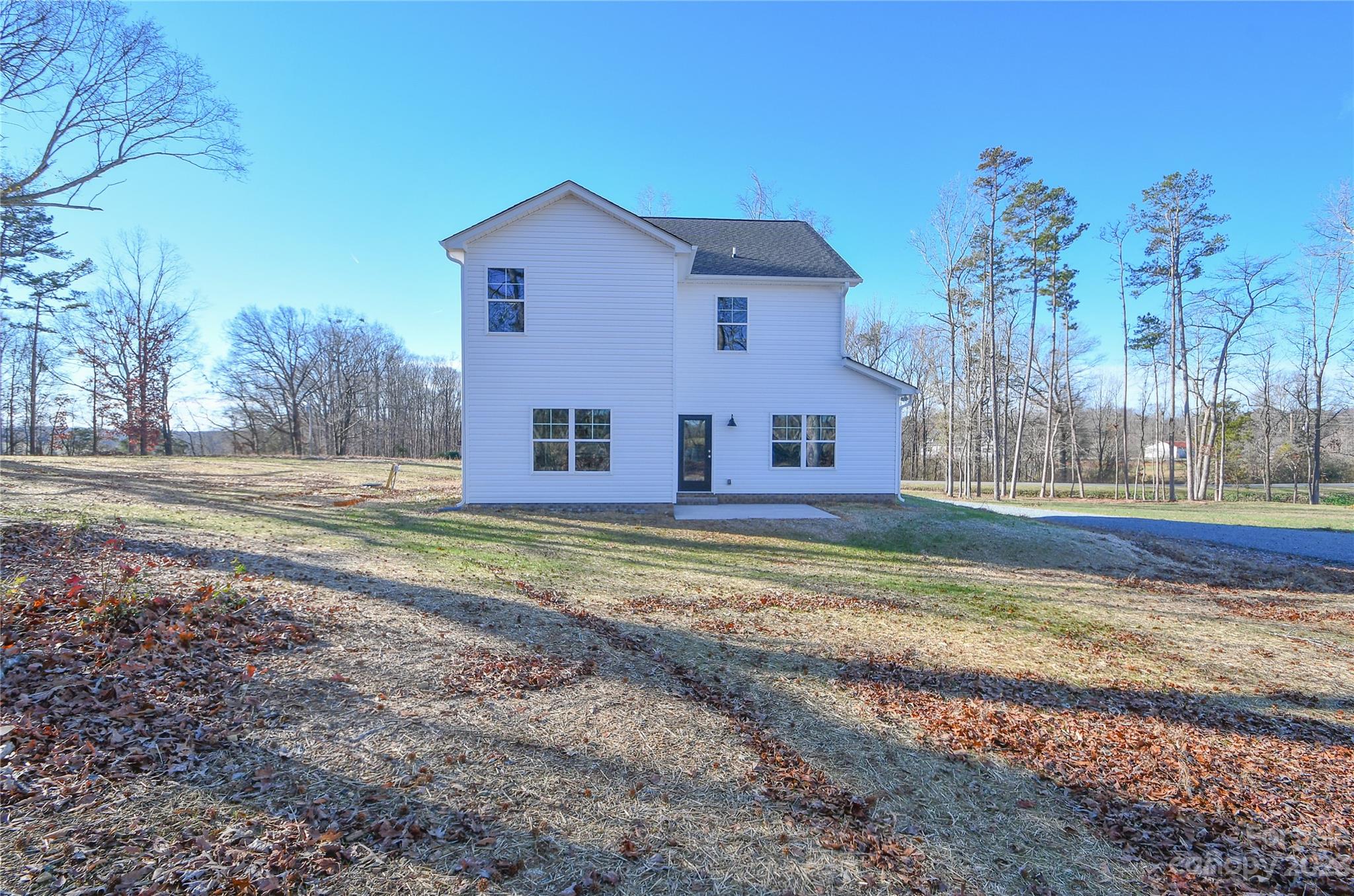 1620 McIntyre Road, Unit 8 Wingate, NC 28174 - Photo 2 of 31 a view of a house with a yard