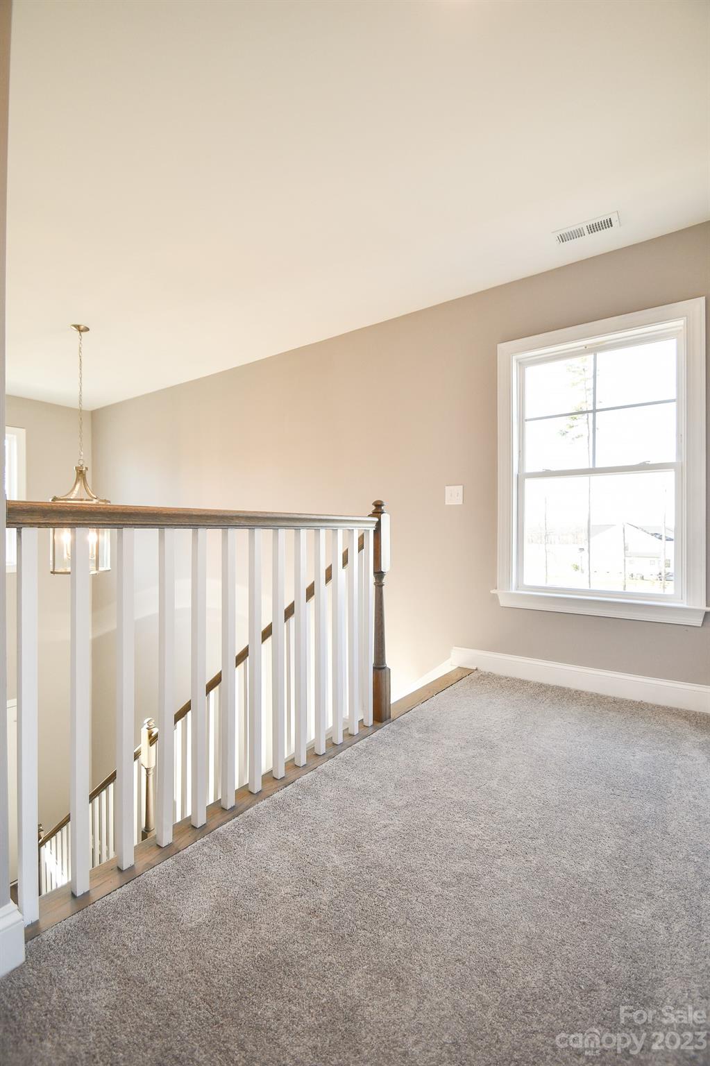 1620 McIntyre Road, Unit 8 Wingate, NC 28174 - Photo 29 of 31 a view of an empty room with a window