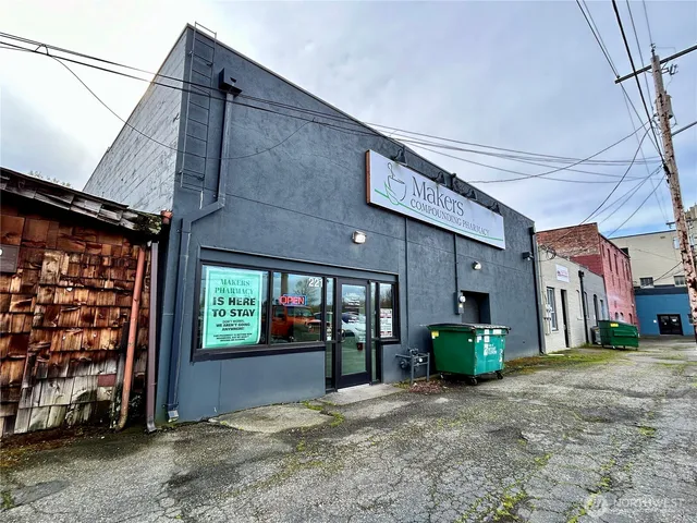 a view of a building with a street