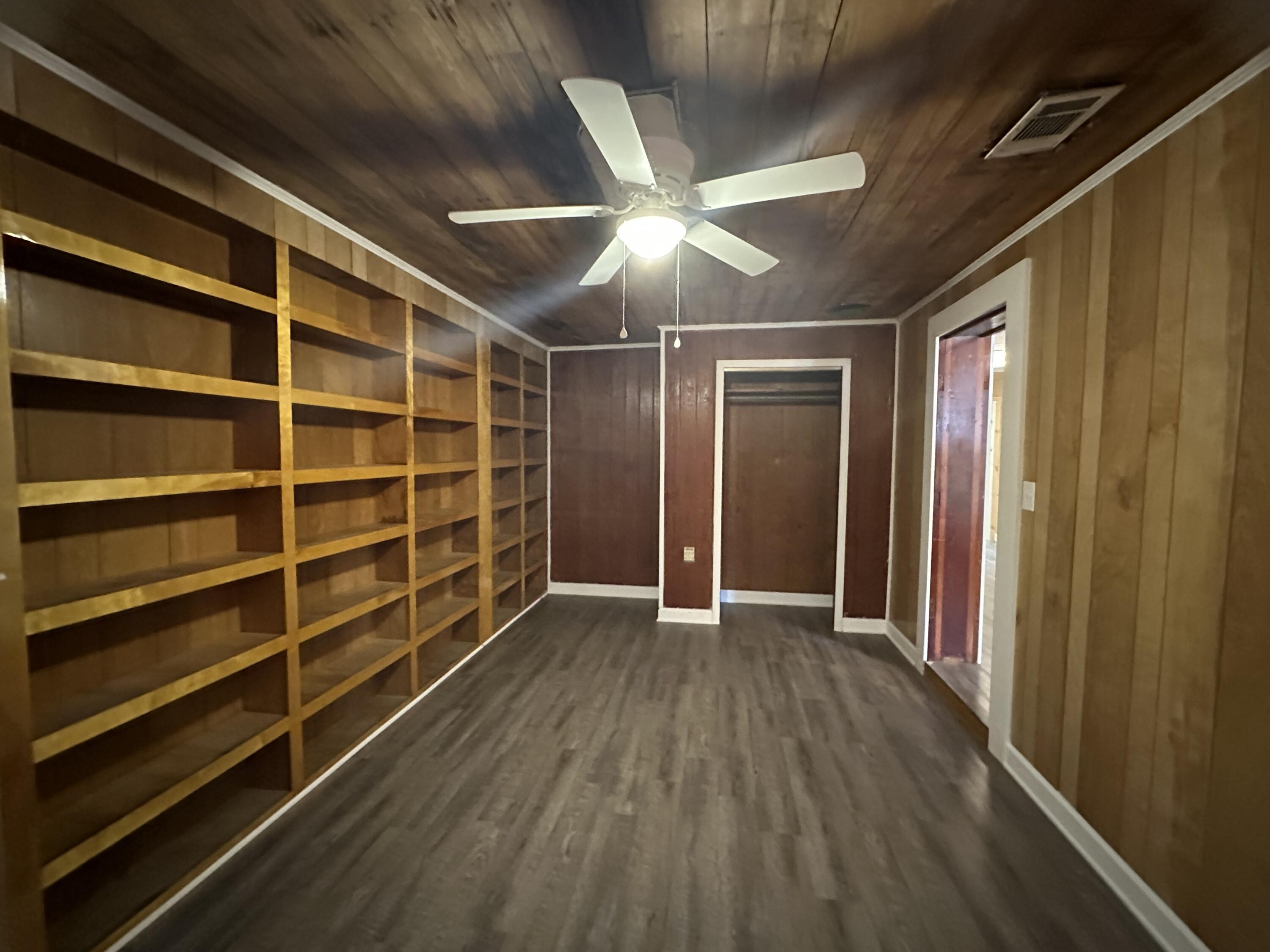 108 Sikes Drive Crestview, FL 32539 - Photo 23 of 41 a view of an empty room with a window