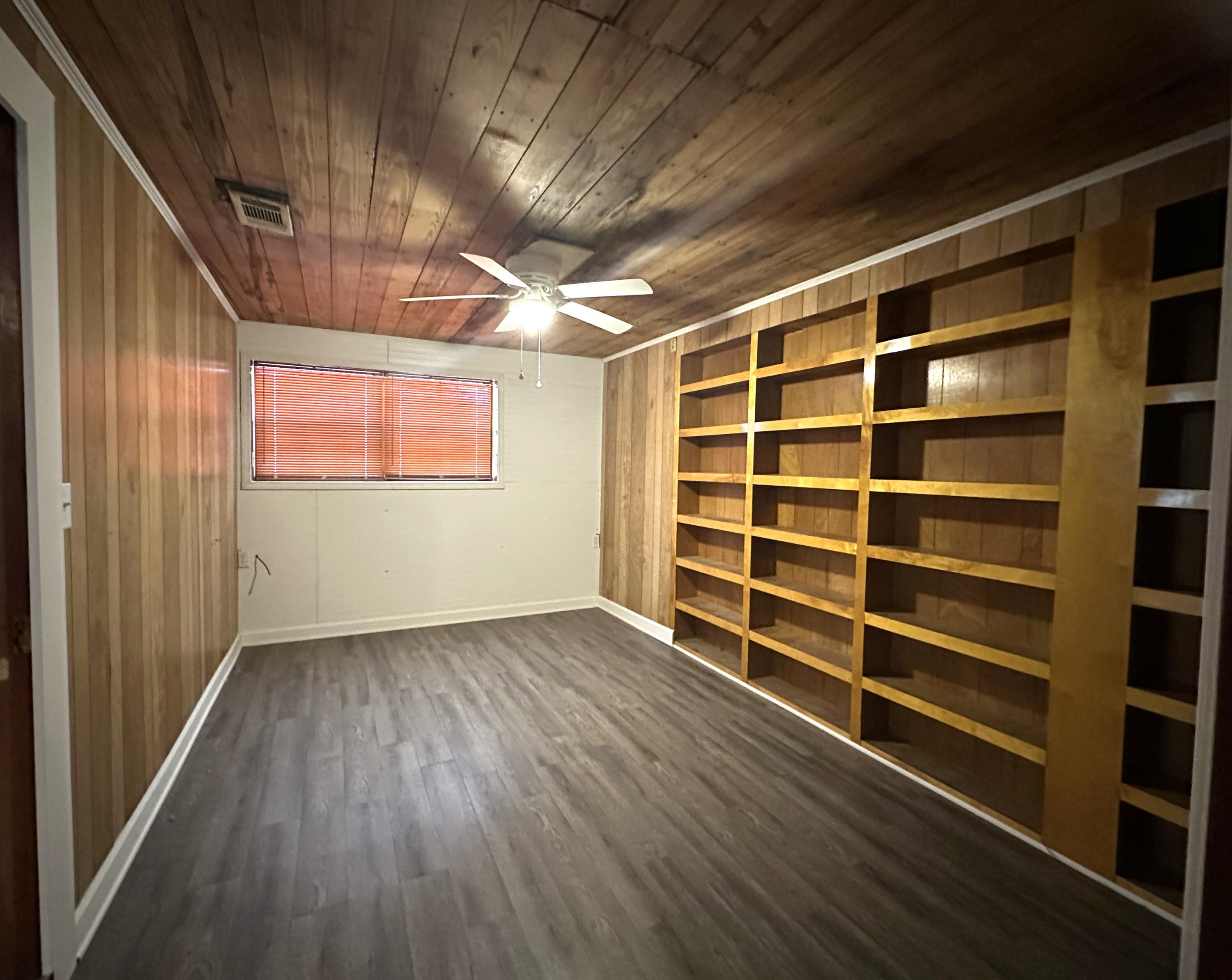 108 Sikes Drive Crestview, FL 32539 - Photo 24 of 41 a view of an empty room with a window