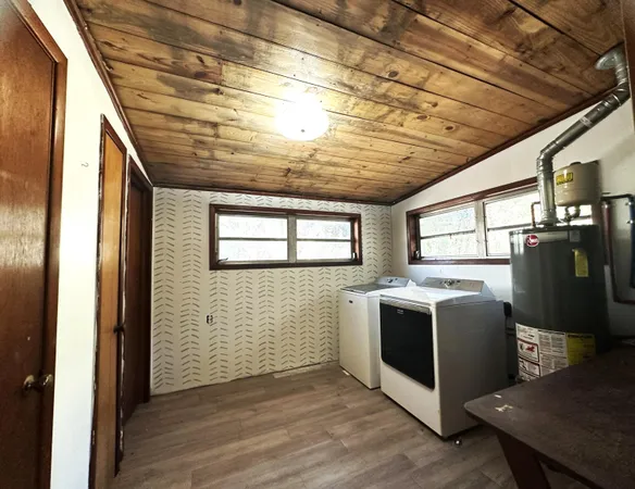 a view of house with patio outdoor seating and covered with chairs