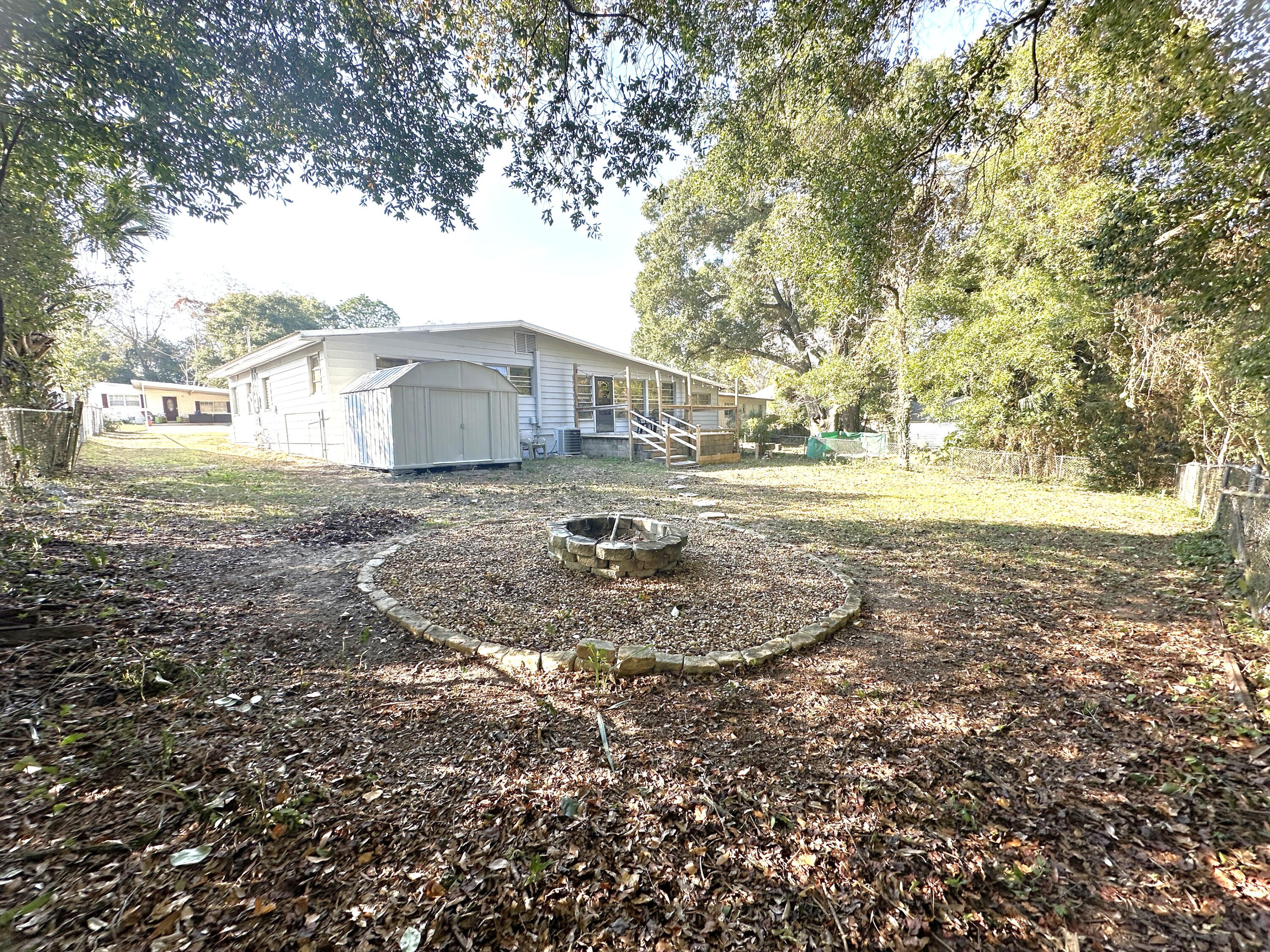 108 Sikes Drive Crestview, FL 32539 - Photo 32 of 41 a view of a house with a yard
