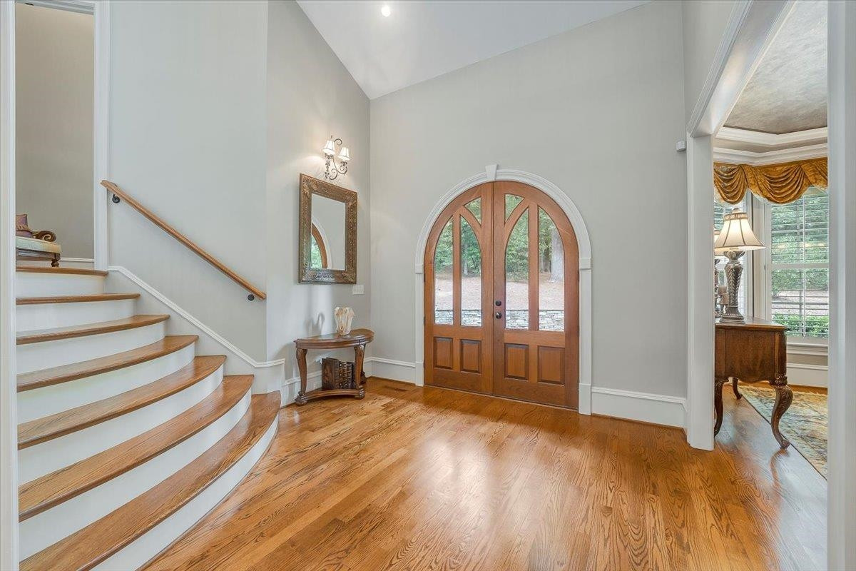 9712 Honeycutt Road Raleigh, NC 27614 - Photo 4 of 83 Greet Your Guests at the Radius Arch Double Wooden Doors and Stunning Foyer Front Foyer