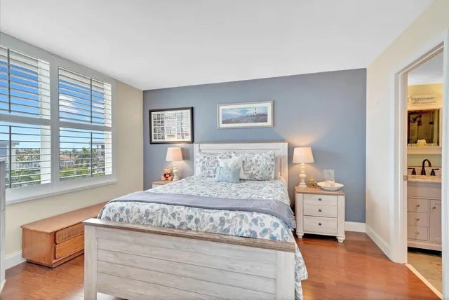 a bedroom with a bed and a cabinets