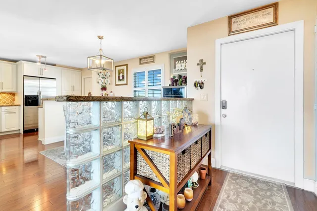 a view of a kitchen with cabinets