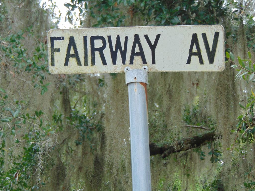 Fairway Avenue Eustis, FL 32726 - Photo 2 of 10 a signage on a wall