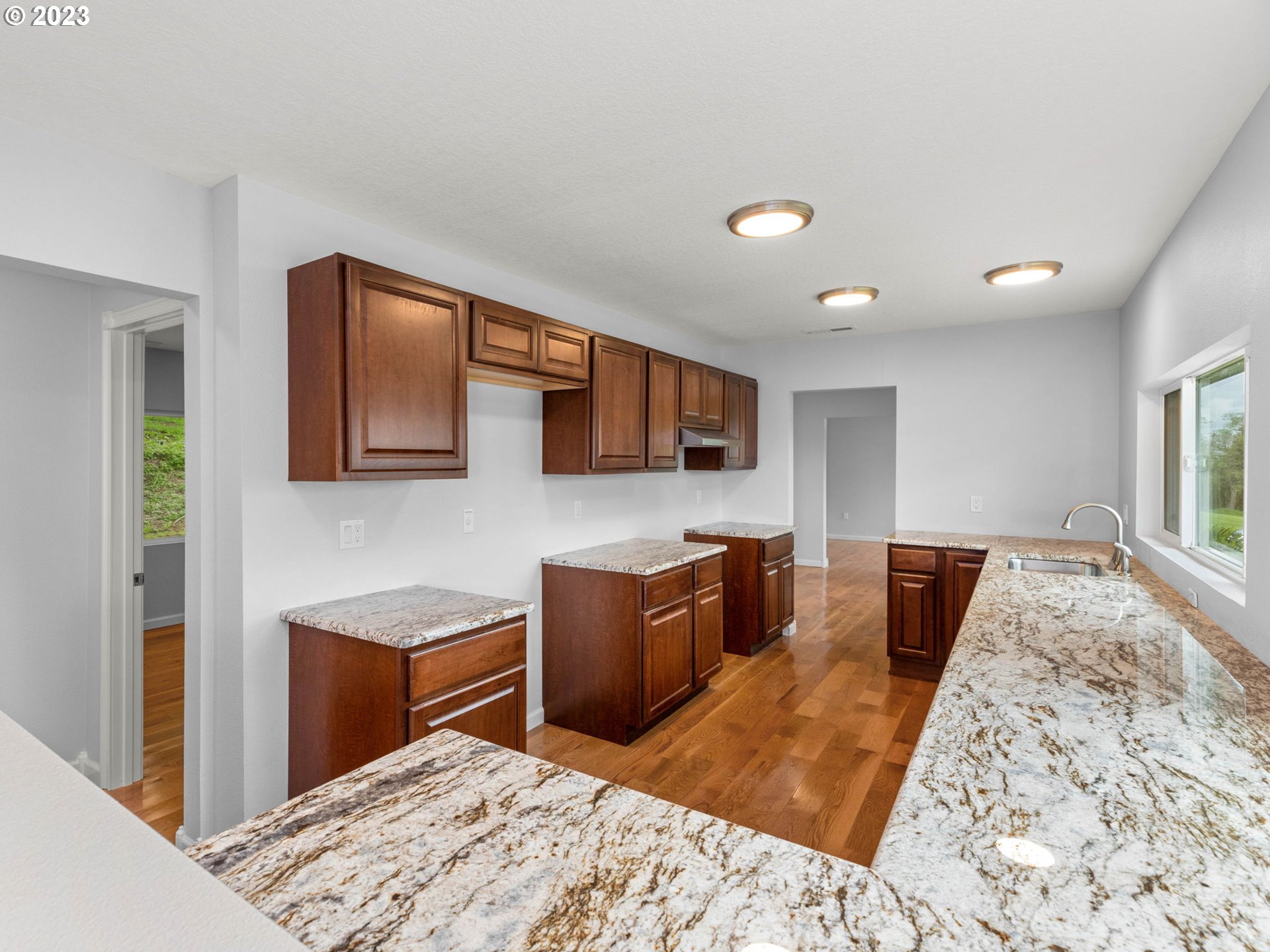 36810 Northeast Reed Road Corbett, OR 97019 - Photo 12 of 28 a bedroom with a bed and wooden floor
