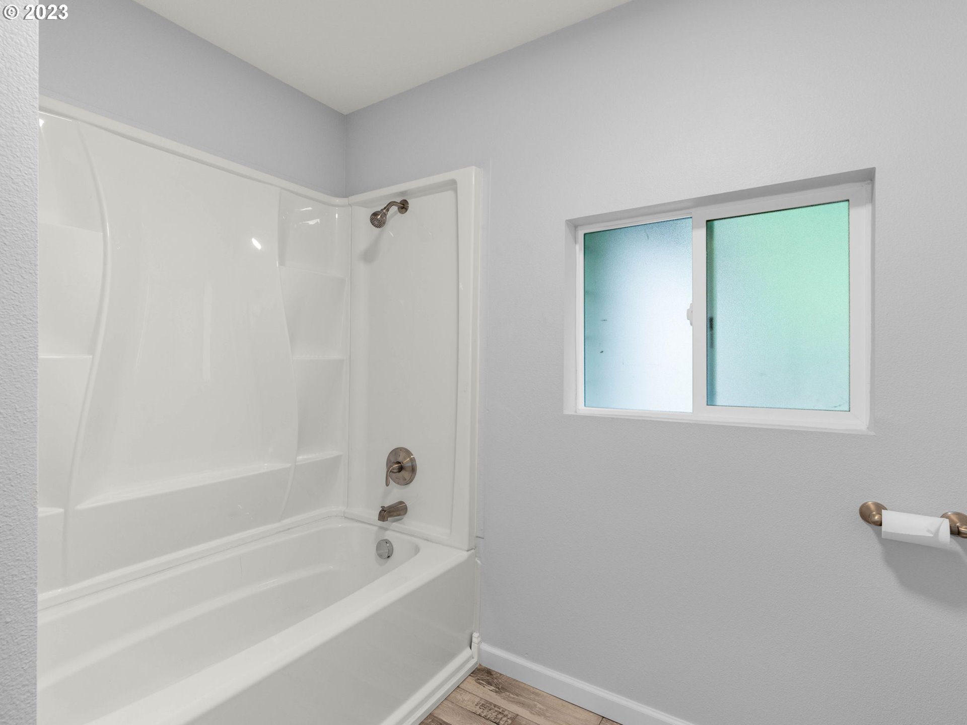 36810 Northeast Reed Road Corbett, OR 97019 - Photo 17 of 28 a bathroom with a bathtub and a shower