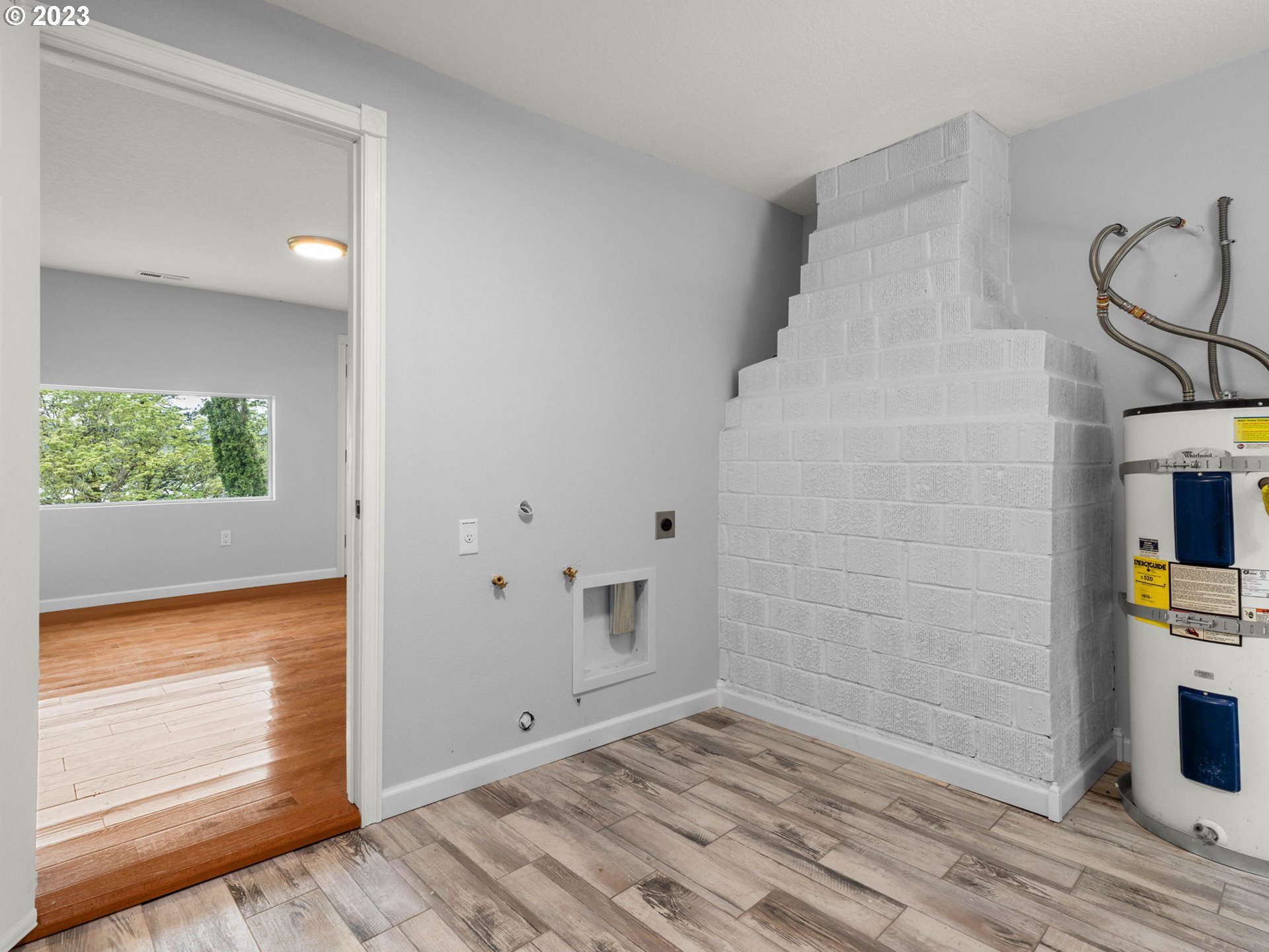 36810 Northeast Reed Road Corbett, OR 97019 - Photo 21 of 28 a view of empty room with window and wooden floor