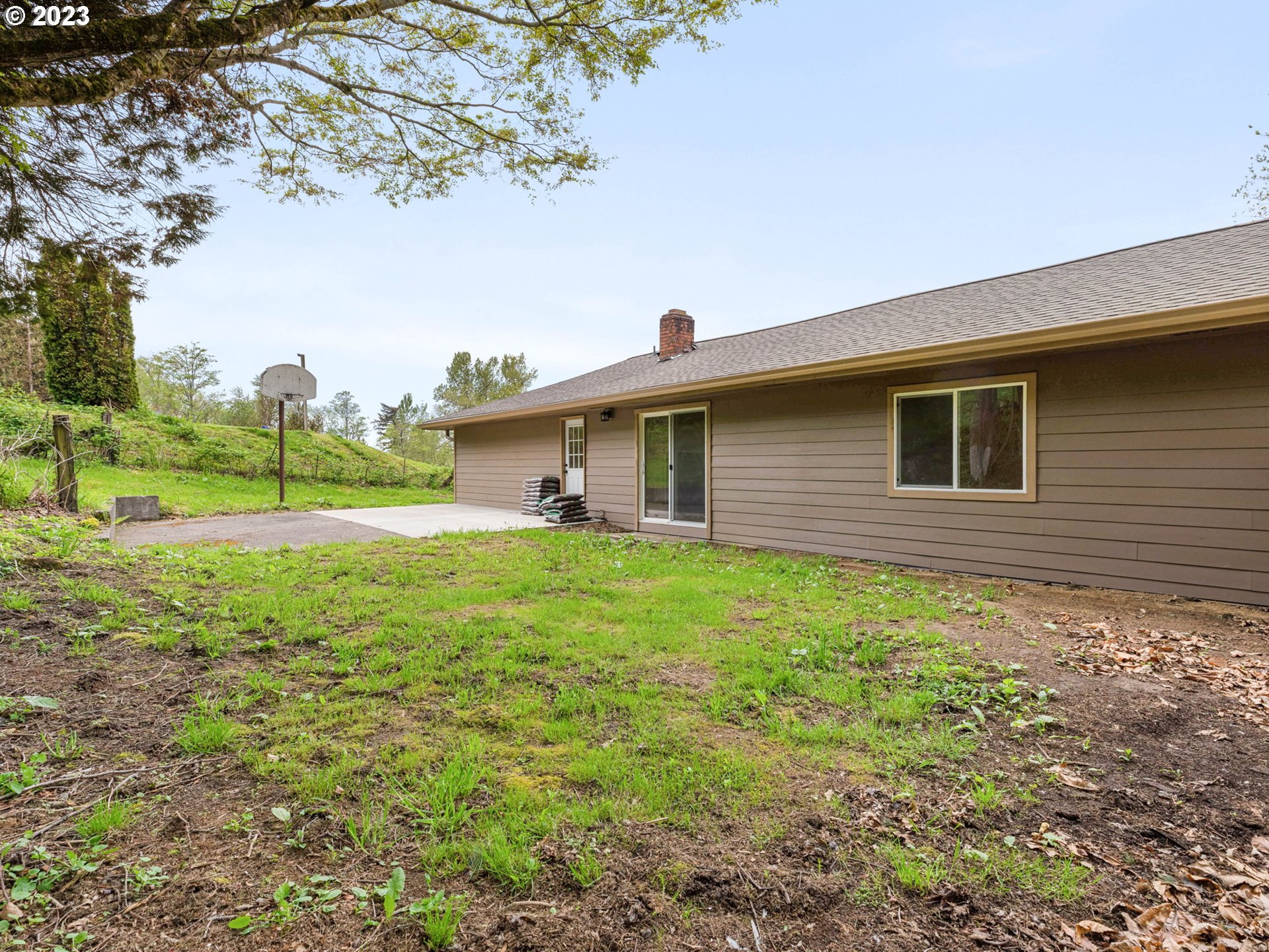 36810 Northeast Reed Road Corbett, OR 97019 - Photo 22 of 28 a view of a house with a backyard