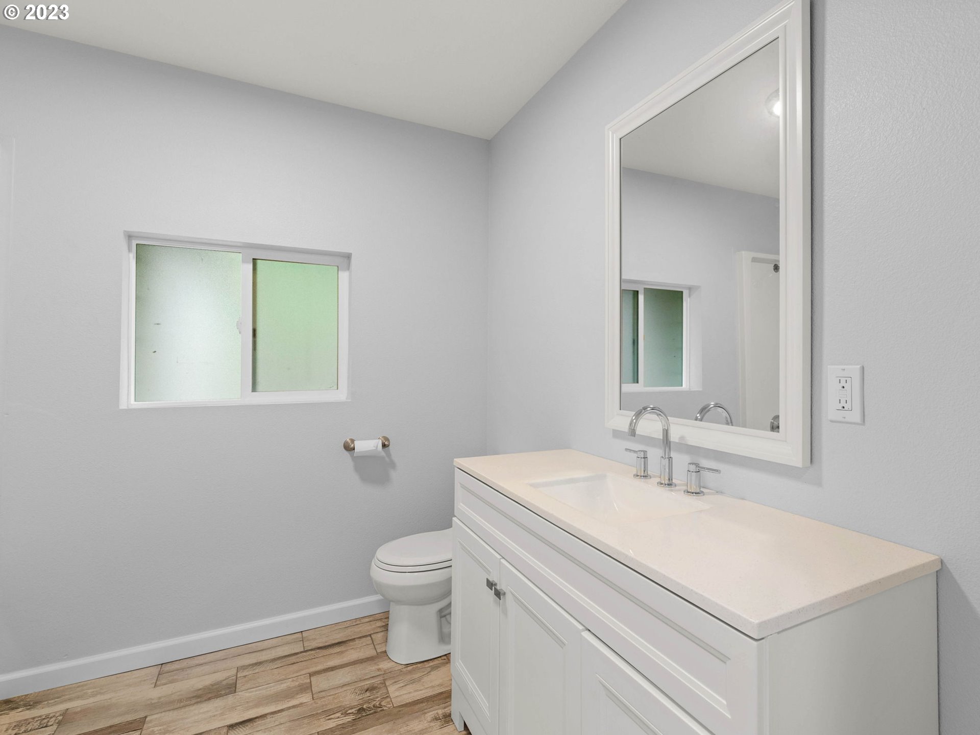 36810 Northeast Reed Road Corbett, OR 97019 - Photo 25 of 28 a bathroom with a sink toilet and mirror
