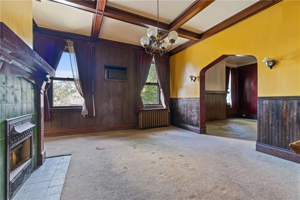 1300 Beechview Avenue Beechview, PA 15216 - Photo 20 of 31 a view of empty room with wooden floor and windows