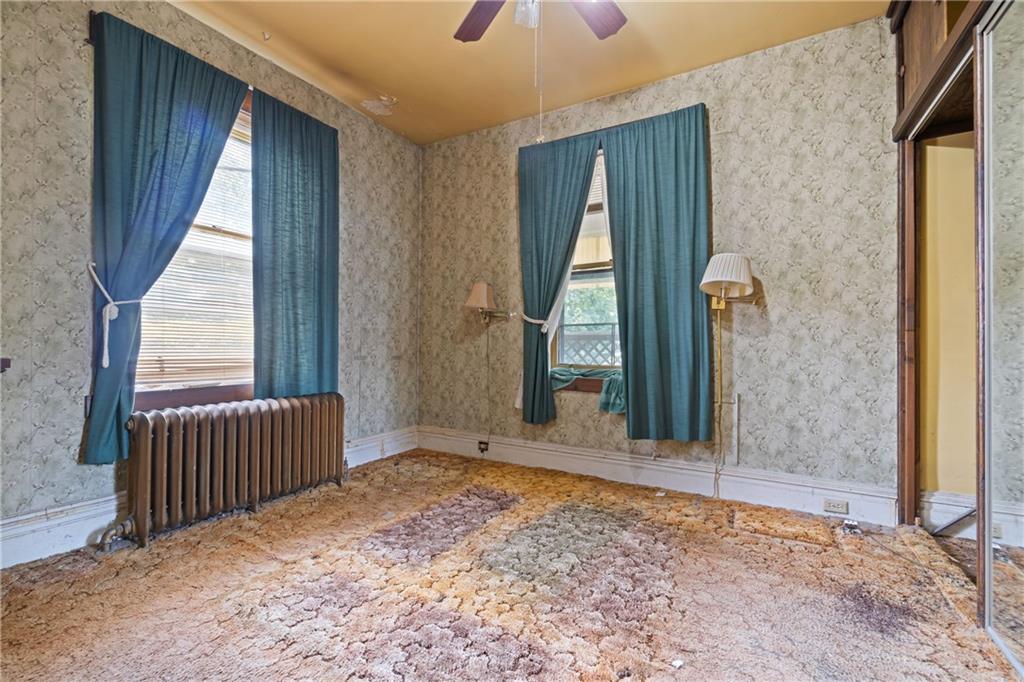 1300 Beechview Avenue Beechview, PA 15216 - Photo 25 of 31 an empty room with windows