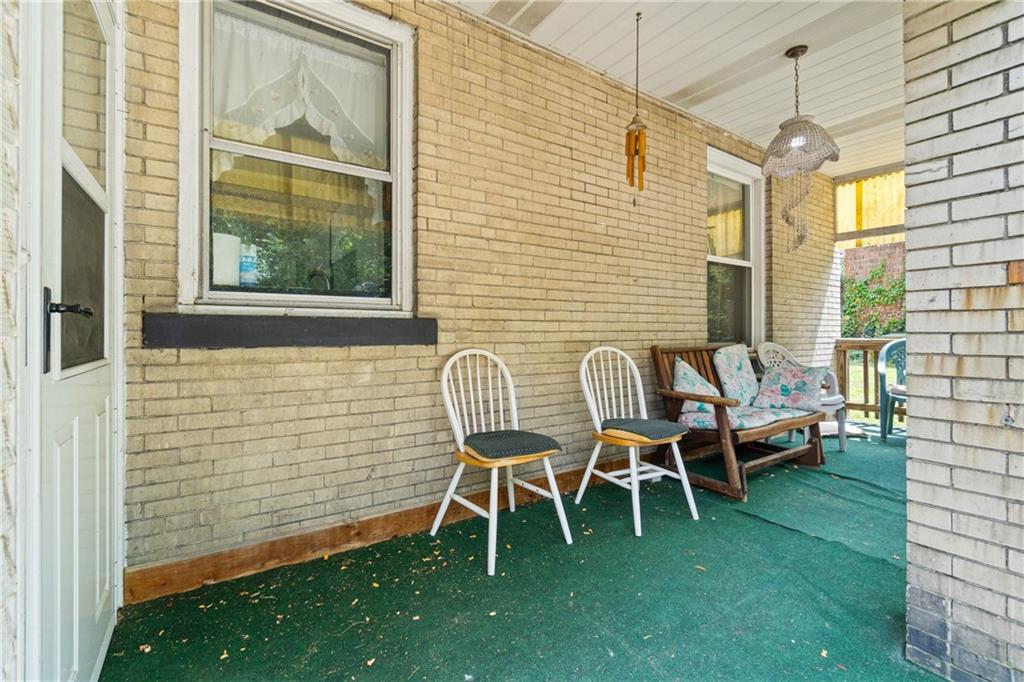 1300 Beechview Avenue Beechview, PA 15216 - Photo 29 of 31 a balcony with chairs and table