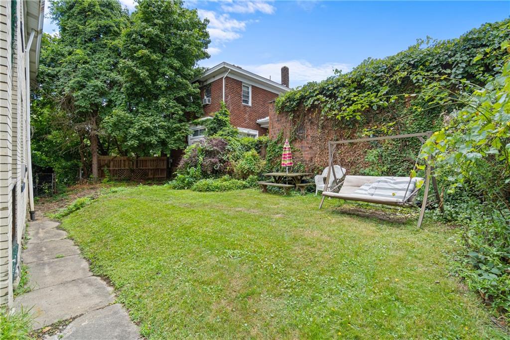 1300 Beechview Avenue Beechview, PA 15216 - Photo 30 of 31 a backyard of a house with outdoor seating