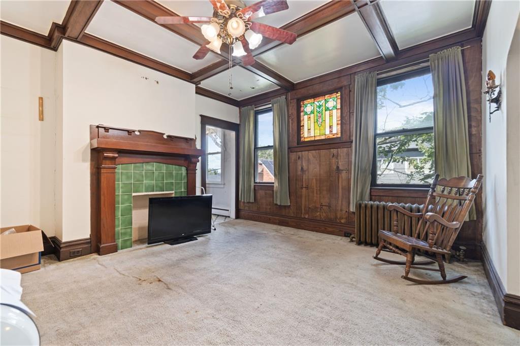 1300 Beechview Avenue Beechview, PA 15216 - Photo 8 of 31 a view of a livingroom with furniture window and wooden floor