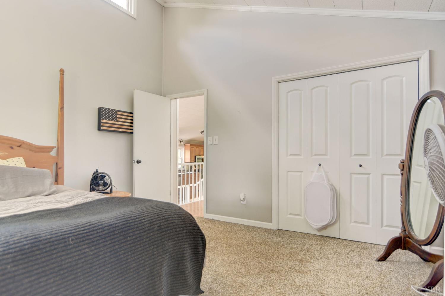 1112 Twinleaf Road Goode, VA 24556 - Photo 11 of 36 a bedroom with a bed and a window