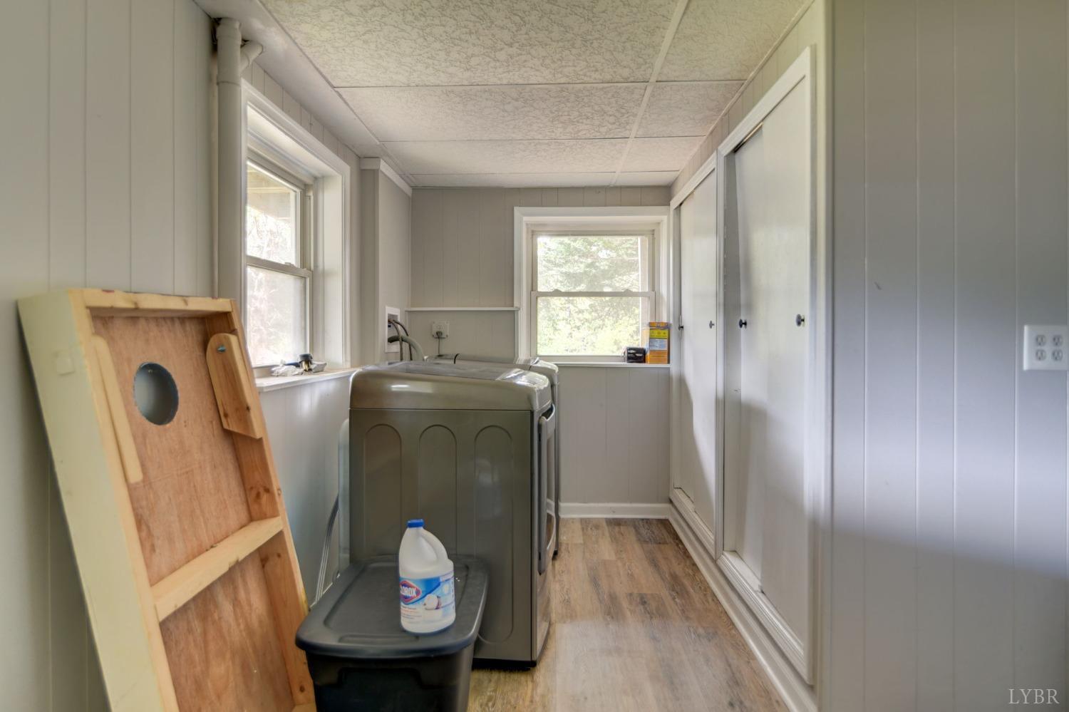 1112 Twinleaf Road Goode, VA 24556 - Photo 15 of 36 a utility room with dryer and washer