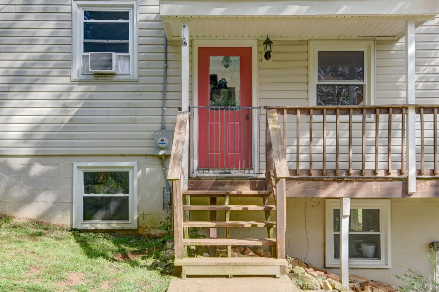 1112 Twinleaf Road Goode, VA 24556 - Photo 2 of 36 front view of a brick house with a window