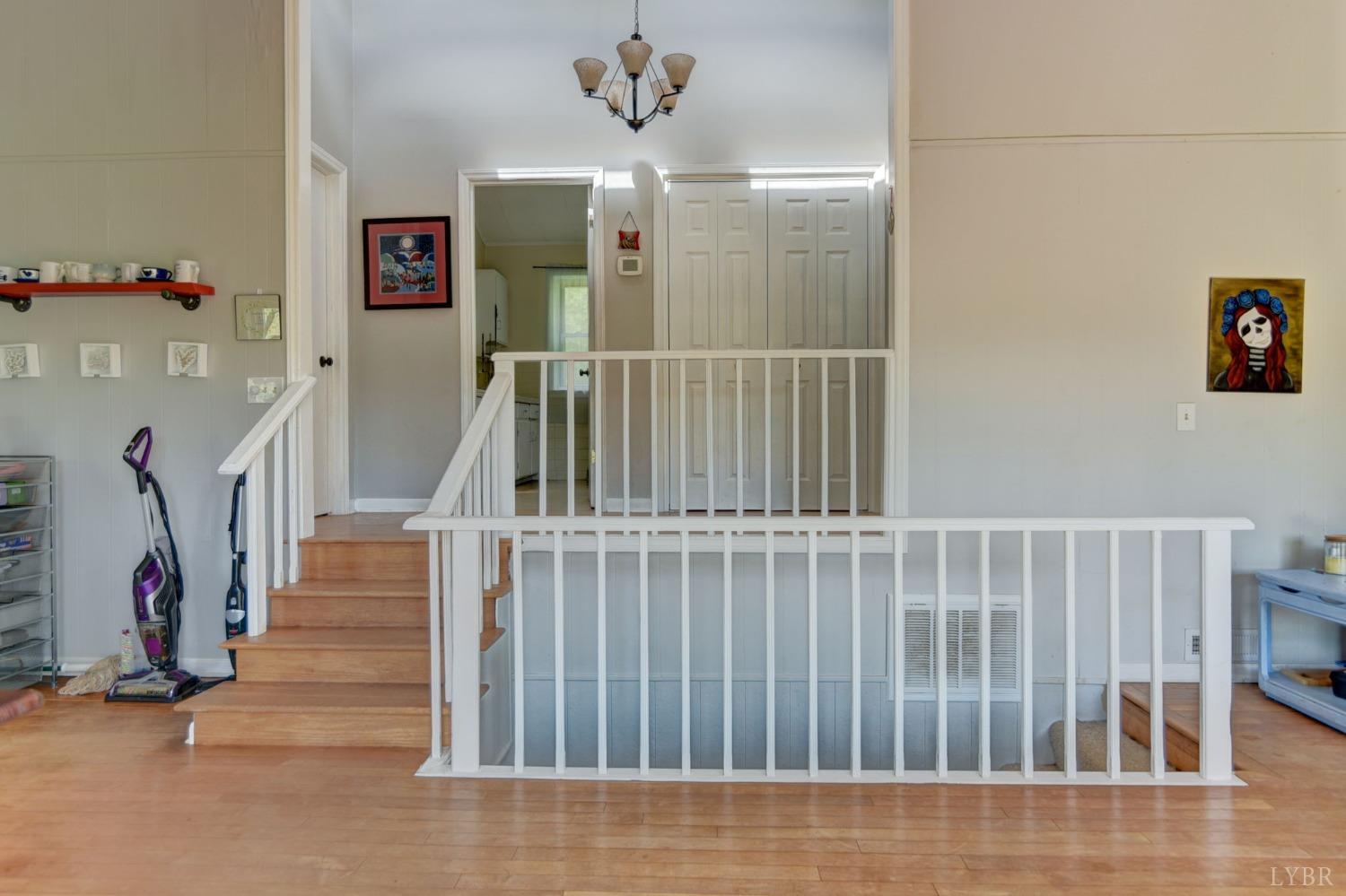 1112 Twinleaf Road Goode, VA 24556 - Photo 6 of 36 a view of staircase with white walls and a window