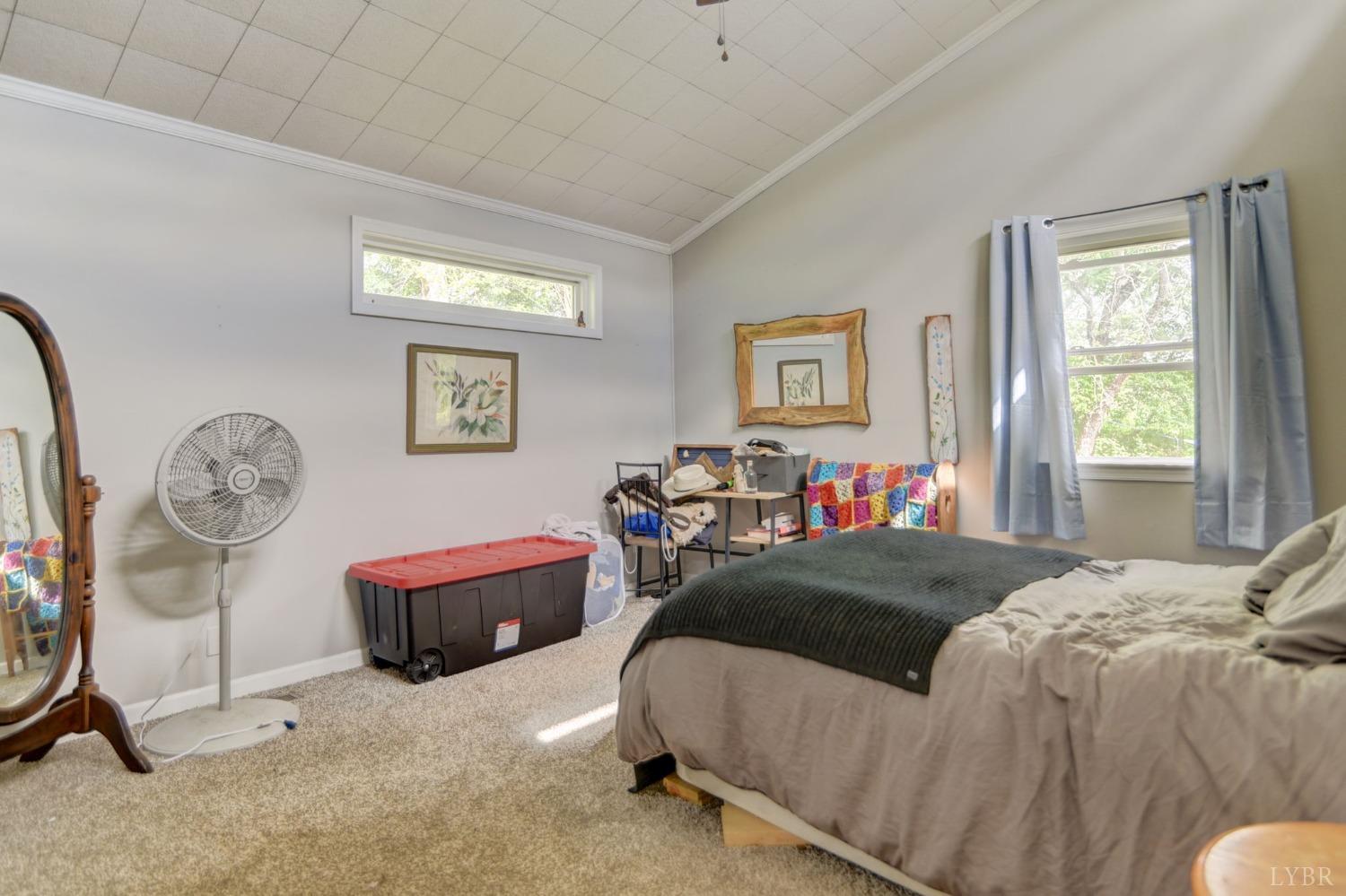 1112 Twinleaf Road Goode, VA 24556 - Photo 10 of 36 a bedroom with bed and a window