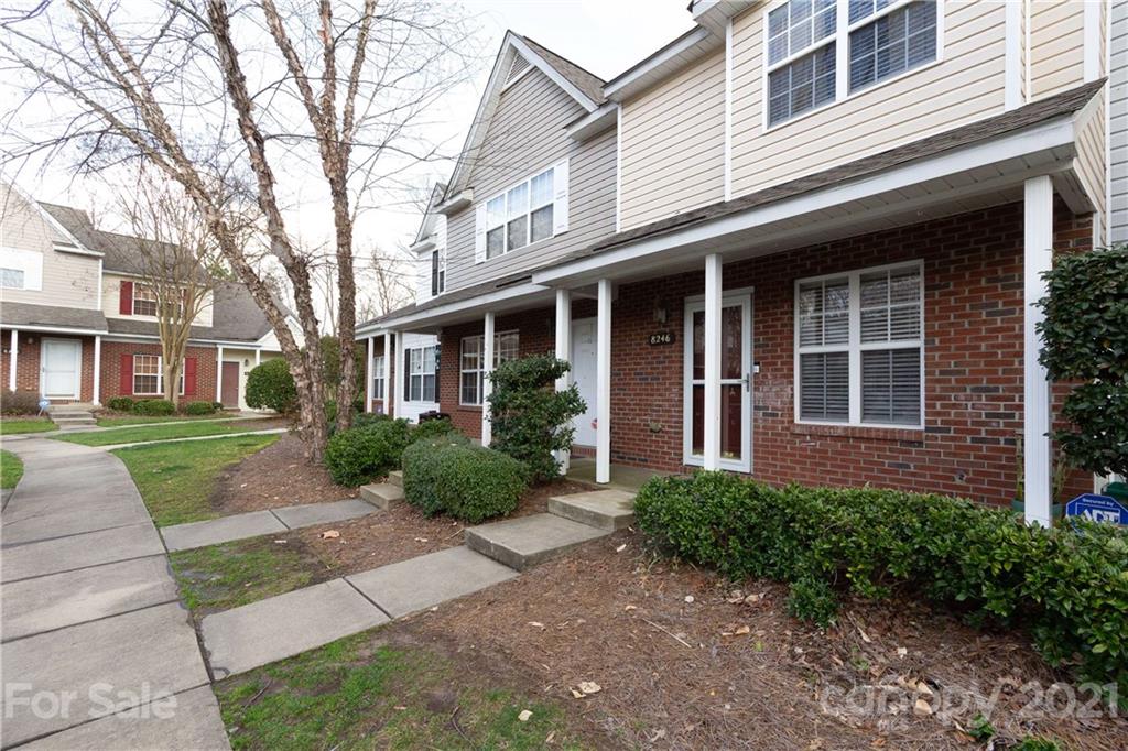 8246 Rudolph Road Charlotte, NC 28216 - Photo 2 of 29 front view of a brick house with a yard