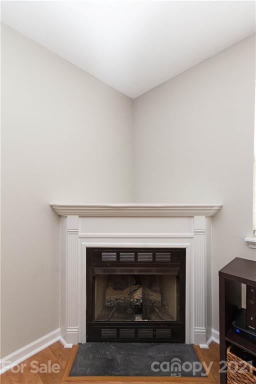 8246 Rudolph Road Charlotte, NC 28216 - Photo 14 of 29 a living room with a fireplace