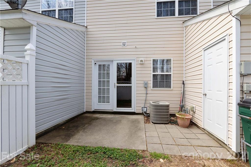 8246 Rudolph Road Charlotte, NC 28216 - Photo 28 of 29 a view of a back side of house