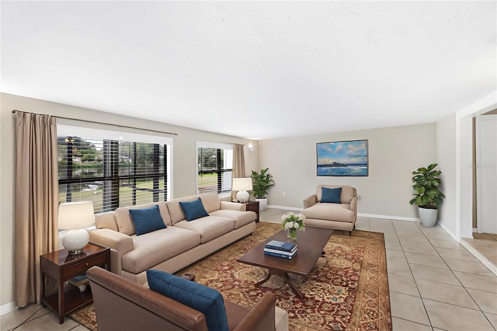 3452 Desoto Road Sarasota, FL 34235 - Photo 15 of 42 a living room with furniture and a large window