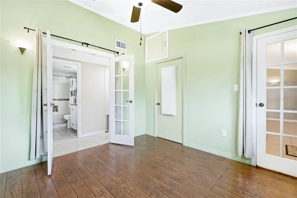 3452 Desoto Road Sarasota, FL 34235 - Photo 28 of 42 a view of a bathroom with wooden floor