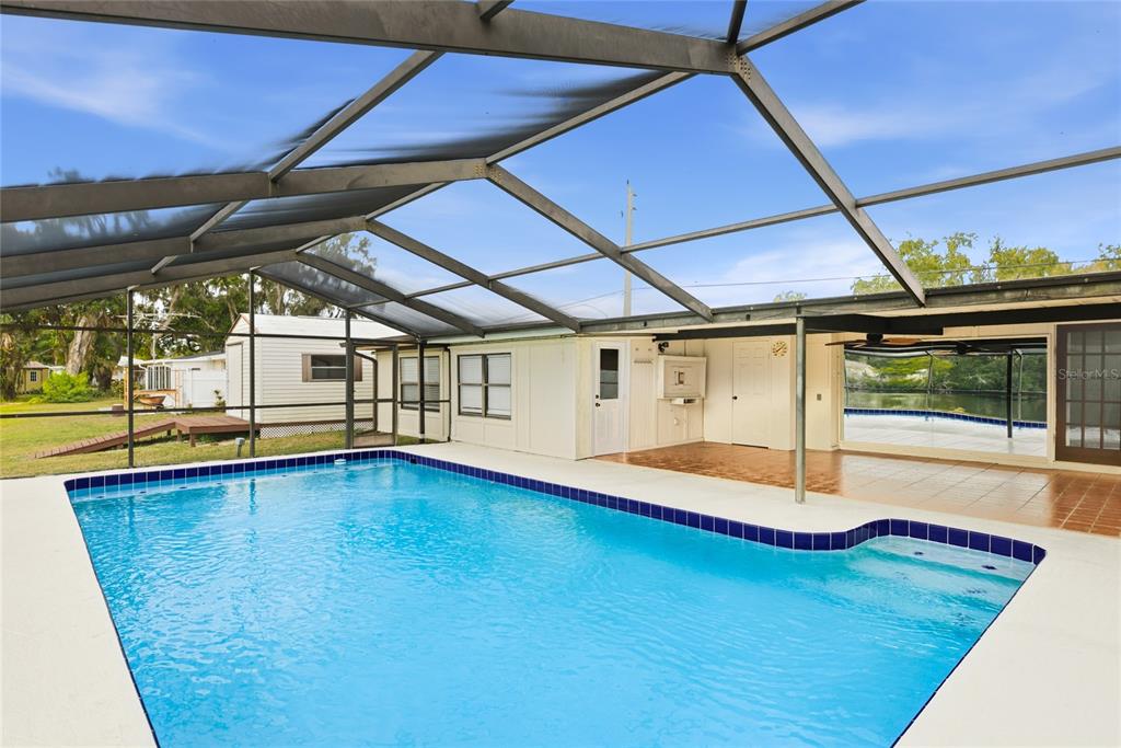 3452 Desoto Road Sarasota, FL 34235 - Photo 32 of 42 a view of swimming pool with seating area