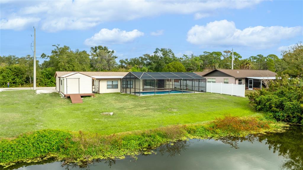 3452 Desoto Road Sarasota, FL 34235 - Photo 37 of 42 a front view of house with yard and green space