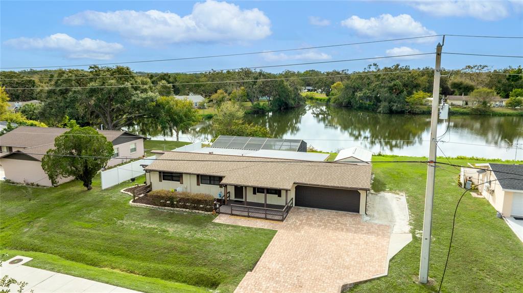 3452 Desoto Road Sarasota, FL 34235 - Photo 41 of 42 a view of a lake with a garden and houses